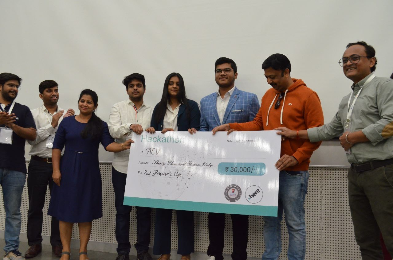 Team ACV receiving the hackathon 2nd runner-up award and ₹30,000 team prize.
